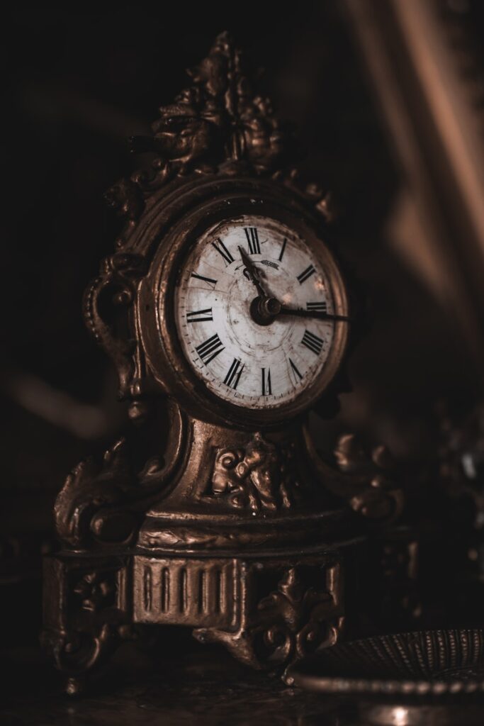 black wooden analog clock